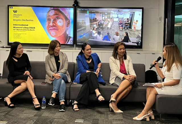 Philippines IWD Employees having a discussion