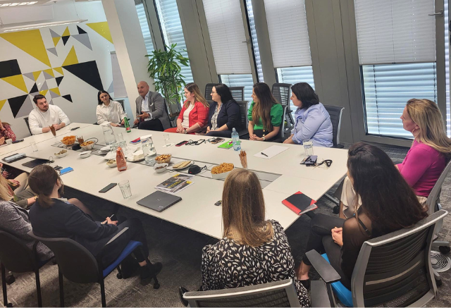 Vienna Circles with Sam Jawad Employees having a discussion